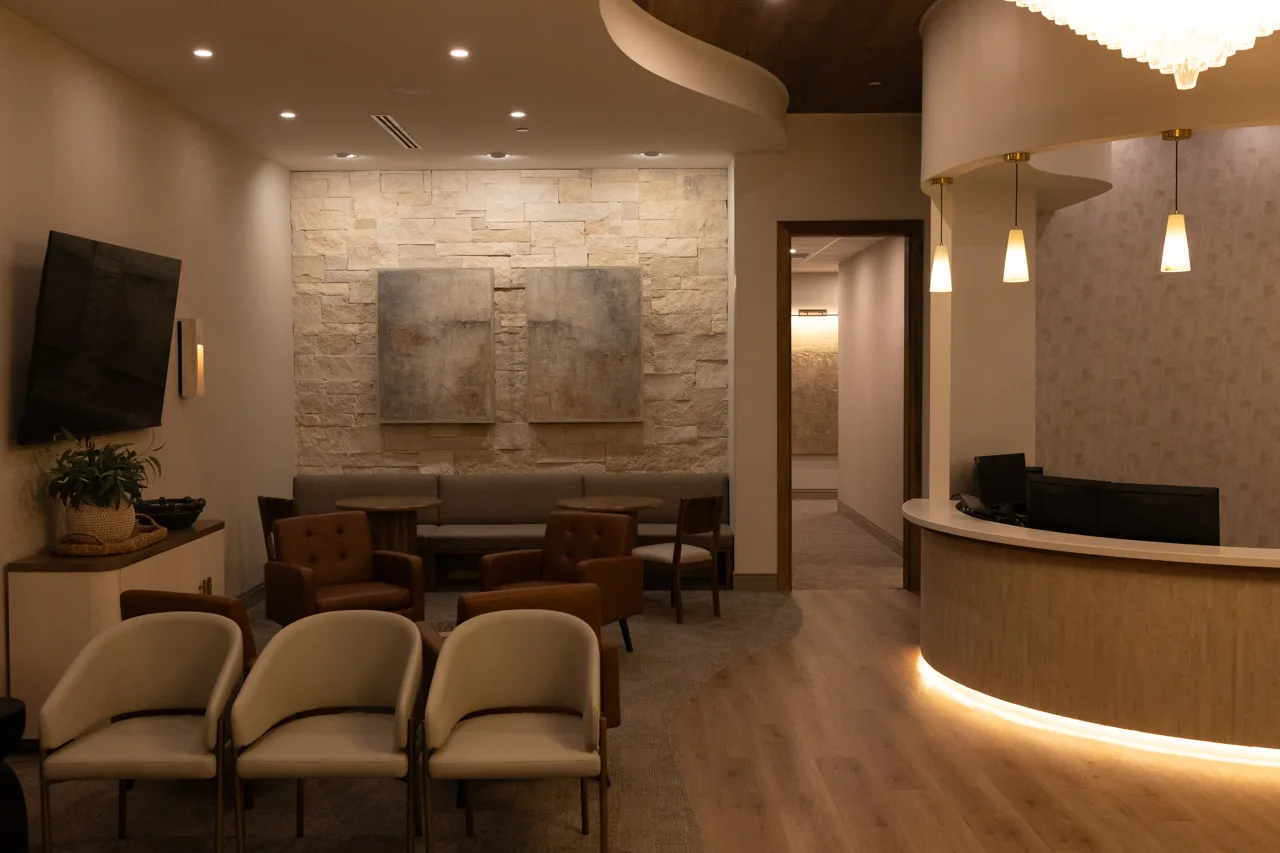 Reception desk and lounge seating in the Hall Dental office
