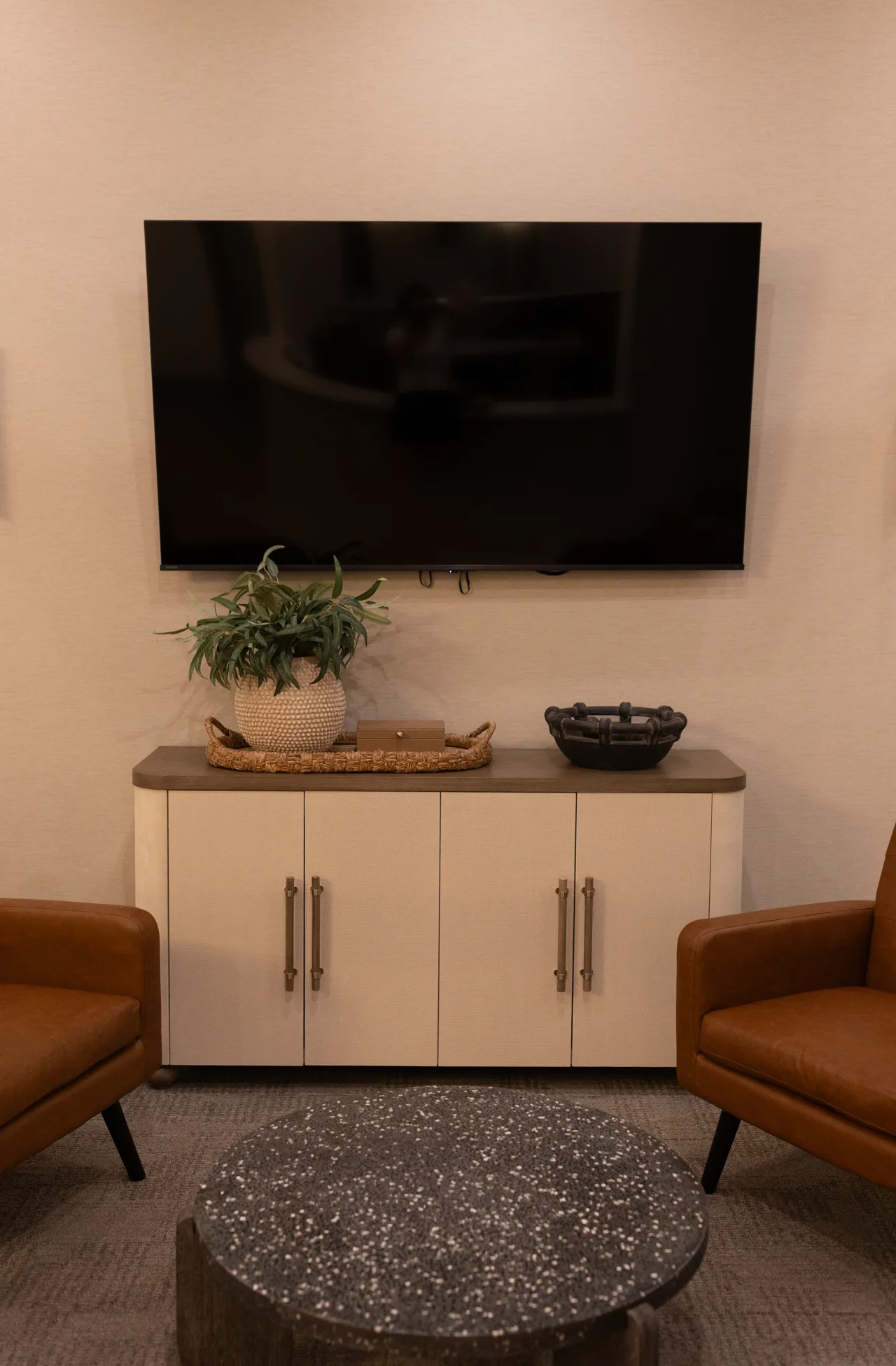 Lounge seating with a coffee table and television